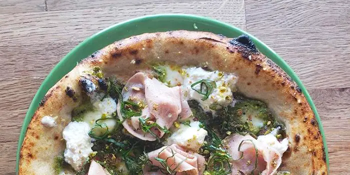 Pistachio crema, Calabrian chili, fresh mozzarella, stracciatella, basil