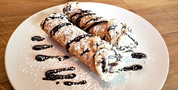 Chocolate Chip Cannoli on white plate